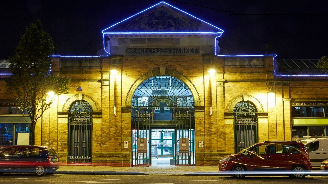 Facade of the entrance to 'St George's Market' illuminated at night Belfast built between 1890-1896